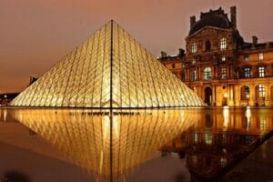 The Louvre Museum in Paris, home to famous art collections like the Mona Lisa. Organized by Europa Travel Hub.